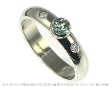 18ct white gold green sapphire and diamond engagement ring