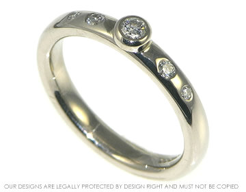 18ct white gold 0.08ct diamond engagement ring with side diamonds 