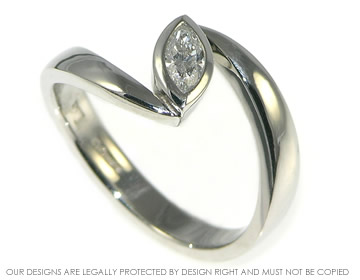 Platinum marquise cut 0.26cts diamond engagement ring.