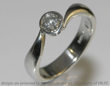 Platinum twist 0.34ct H SI diamond engagement ring. 