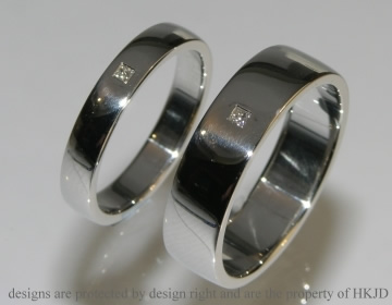 Platinum wedding rings with a 1.5mm princess cut H SI diamond