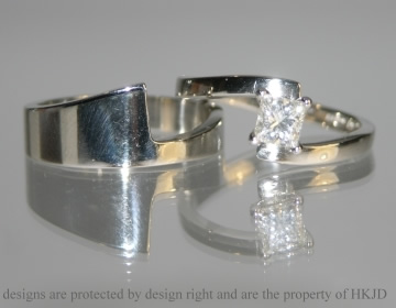 Bespoke platinum wide fitted wedding ring 