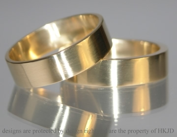 Pair of 9ct yellow gold bespoke wedding rings 