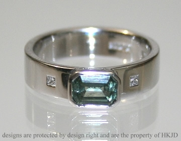 18ct white gold engagement ring with green sapphire and diamonds