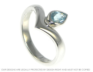 9ct white gold 0.36ct pear shape aquamarine engagement ring. 