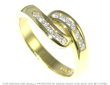 18ct yellow gold eternity ring with channel set diamonds.