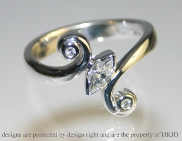 18ct white gold sweet pea inspired diamond engagement ring