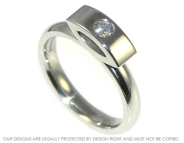 Unusual platinum leaf inspired diamond engagement ring 