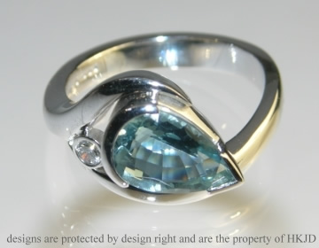 18ct white gold aquamarine and diamond engagement ring.