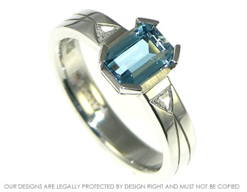 Platinum engagement ring with aquamarine and diamonds