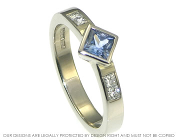 18ct white gold, sapphire and diamond engagement ring