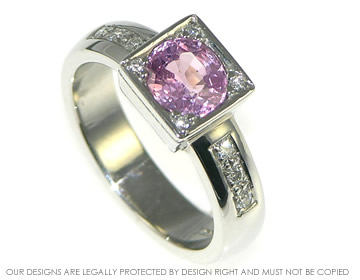 Platinum engagement ring with diamonds and pale pink sapphire