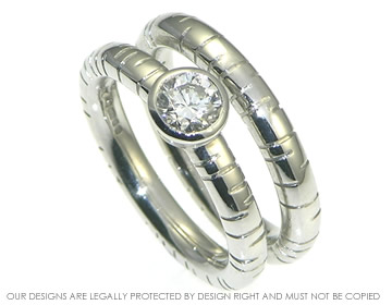 Platinum solitaire diamond ring set inspired by meadow grasses.