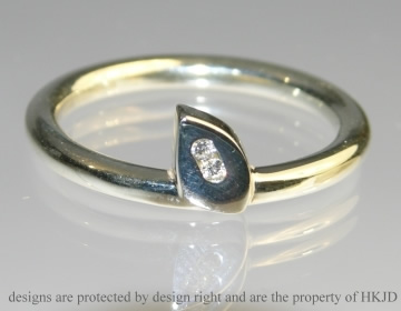 Delicate white gold leaf shaped  ring