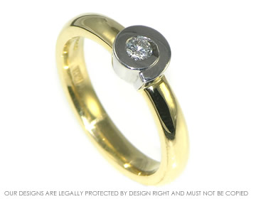  Diamond solitaire engagement ring with curl setting in 18ct gold.