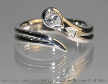 Bespoke 9ct white gold and diamond balloon inspired engagement ring 