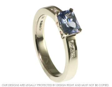 Sapphire and diamond platinum engagement ring