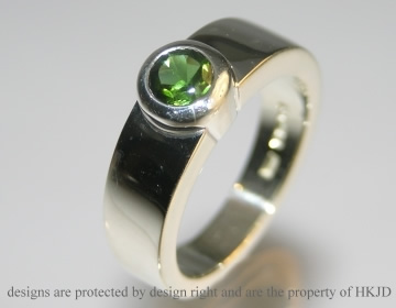 Chunky silver ring with deep green tourmaline