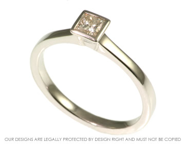 A 9ct white gold and princess cut 0.28ct diamond engagement ring