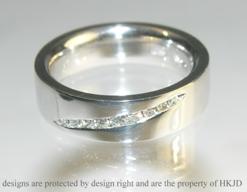 Bespoke 18ct white gold eternity ring with the customer''s own diamonds