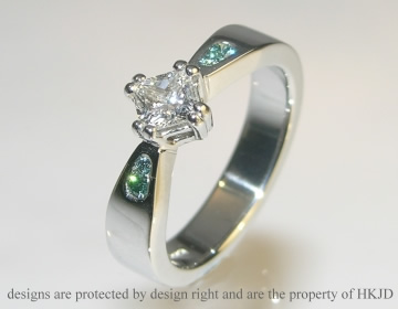 Platinum 0.5octs engagement ring with sky blue diamonds