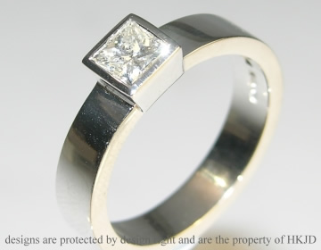 18ct white gold engagement ring with a 0.55ct princess cut diamond 