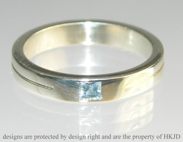 Bespoke 9ct white gold and aquamarine wedding ring.