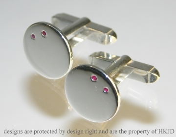 Sterling silver cufflinks with rubies