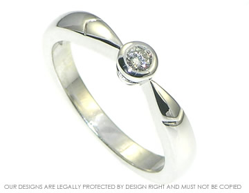 9ct white gold engagement ring with brilliant cut diamond.