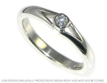 9ct white gold diamond engagement ring with split shoulders.