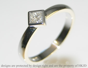 9ct white gold engagement ring with 0.17ct princess cut HSI diamond. 