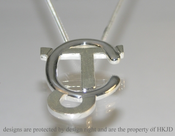 Bespoke Sterling silver initial pendant.