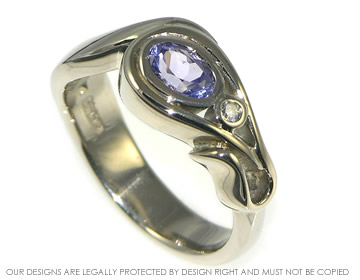 18ct white gold flower inspired diamond and lilac sapphire ring