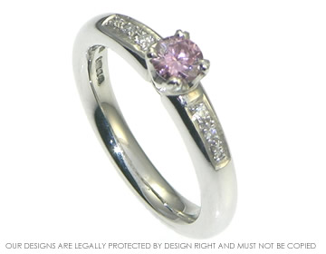 Pink heat-treated diamond platinum engagement ring with white diamonds