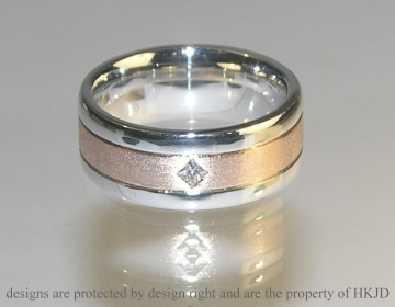 Bespoke rose and white gold wedding ring with a diamond