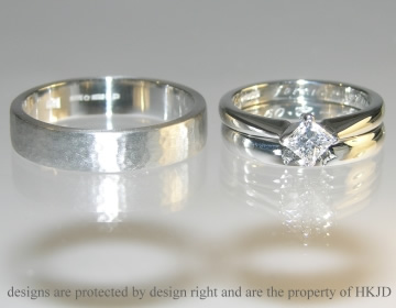 Bespoke platinum and diamond fitted lady's wedding ring and bespoke men's platinum wedding ring