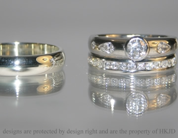 9ct white gold mans wedding band and a bespoke platinum channel set wedding ring with 18 2mm brilliant cut dimaonds. 