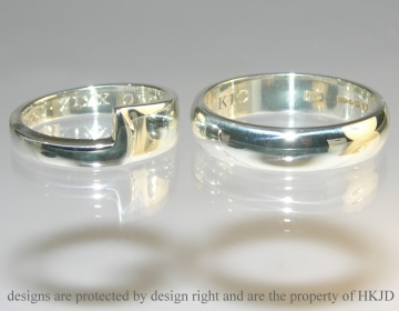 A pair of bespoke 9ct white gold wedding bands 