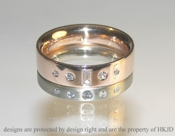 Bespoke 18ct white gold wedding ring with the customer's own diamonds.