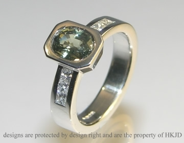 Platinum green sapphire and diamond engagement ring