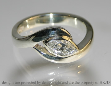 9ct white gold engagement ring with customer's own 7.11x4.10 x 2.63mm  0.46ct marquise shaped diamond.