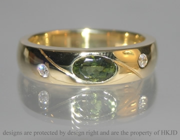 18ct yellow gold dress ring with a green tourmaline 