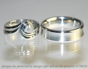 Bespoke shaped platinum wedding ring.