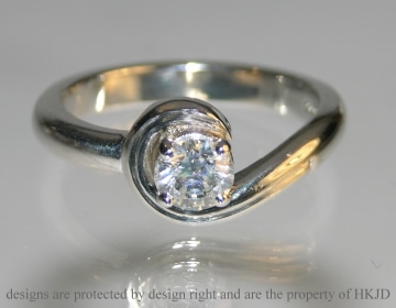 Platinum and diamond engagment ring inspired by music