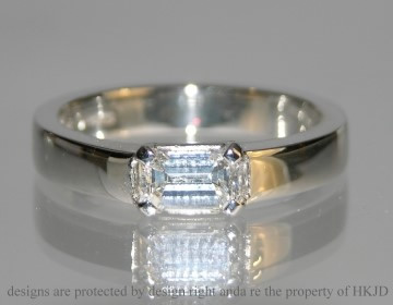 Platinum diamond engagement ring with a 6.3 x4.5mm 
0.81ct in four claw setting