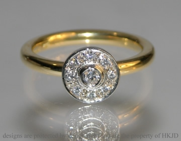 18ct yellow gold and platinum engagement ring with diamonds.