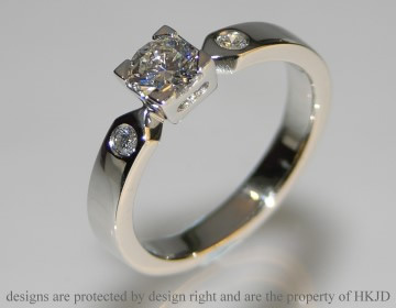 Platinum three diamond engagement ring with 0.43cts centrail diamond