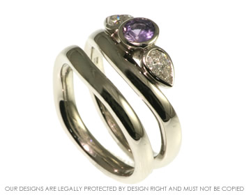 Platinum engagement ring with lilac sapphire and diamonds which gives two different looks