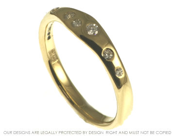 Bespoke 18ct yellow gold eternity ring with scattered diamonds