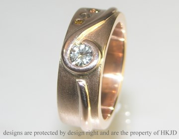 9ct rose gold wedding band and 9ct white gold mans wedding band. 